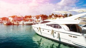 Close up of a boat on the water with other boats in the background on a sunny day at Biscayne Bay Cruise in Miami, Florida, USA